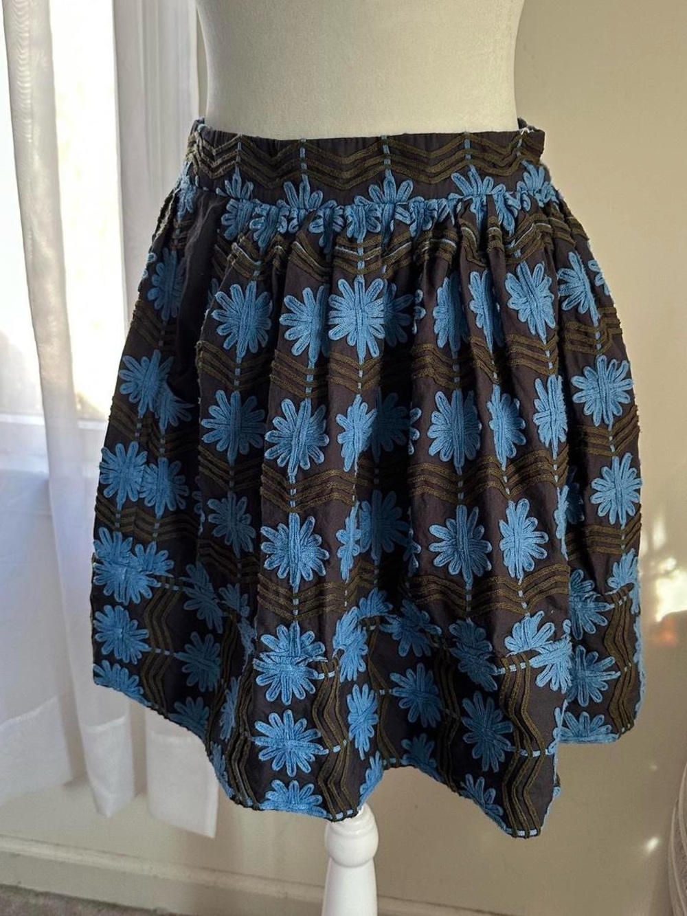 Jill Stuart Black Mini Skirt with Blue Floral Appliqué